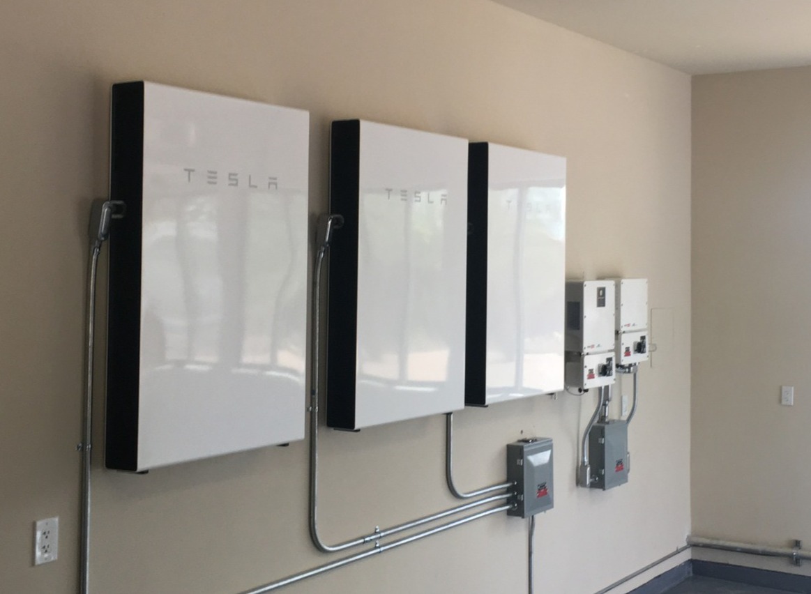 three tesla battery install in aps